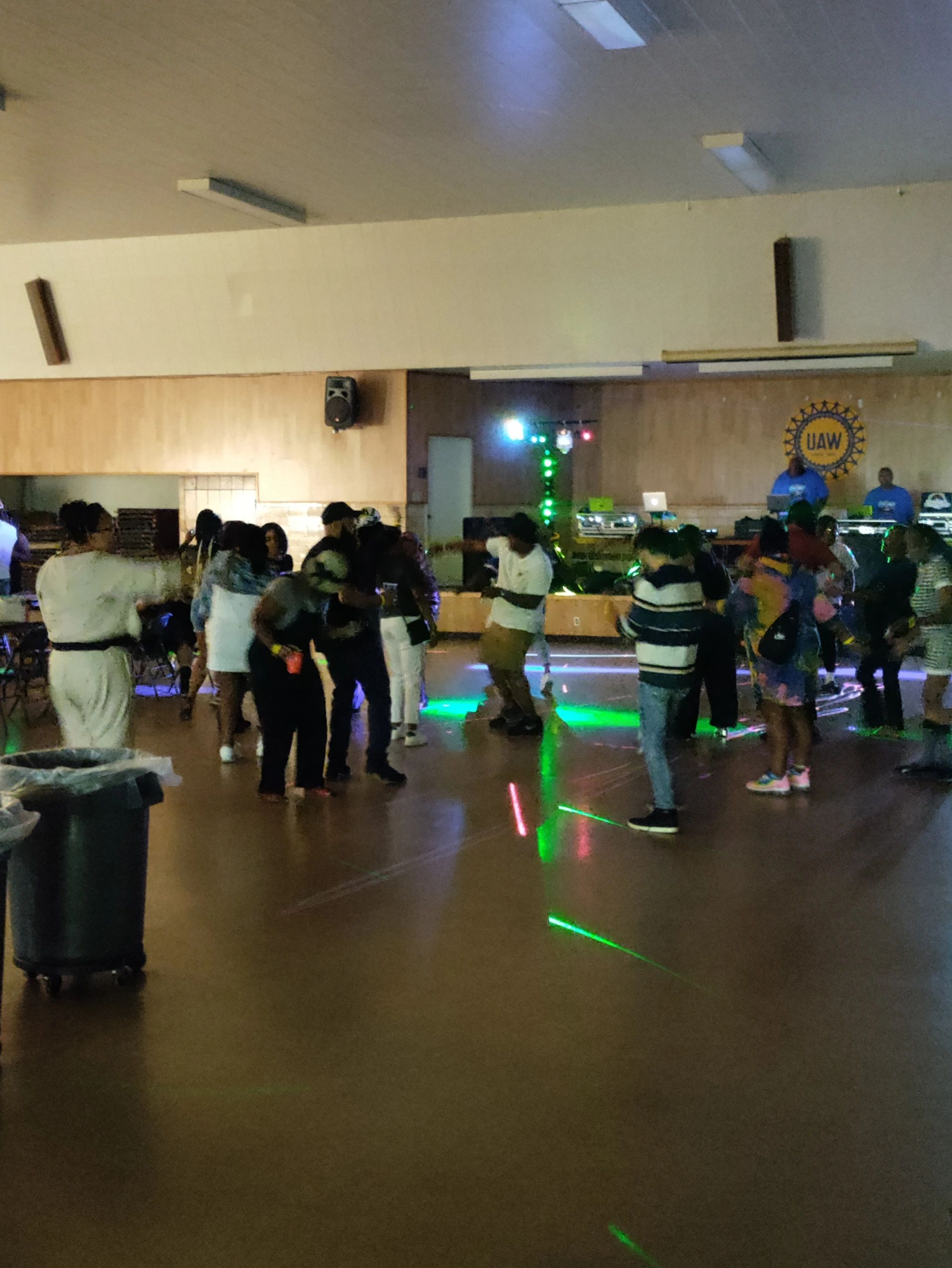 Indoor party dancing colorful lights